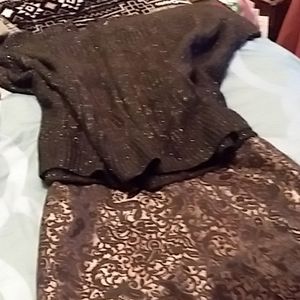 Jaclyn Smith black short sleeve sweater.